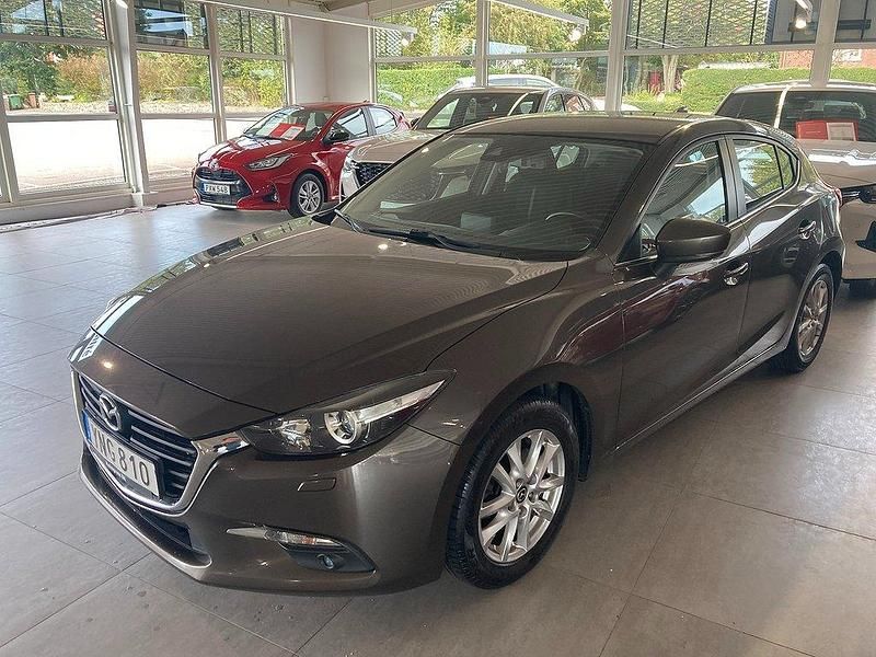Brun Begagnad 2016 Mazda 3 Halvkombi | 124 500 kr (Marknadspris) - Bild 1/4