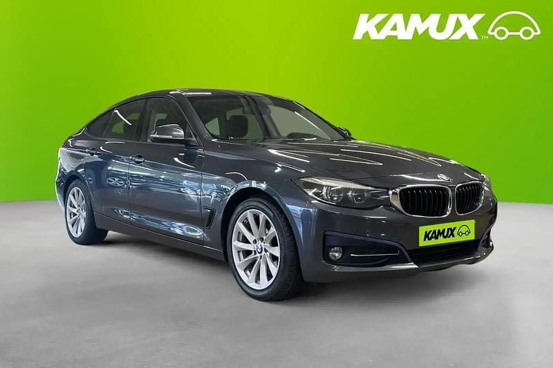 Grå Begagnad 2017 BMW 320 Gran Turismo Sport Line Halvkombi | 154 800 kr (Bra pris) - Bild 1/4