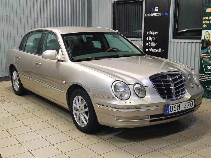 Gul Begagnad 2004 Kia Opirus Sedan | 29 900 kr - Bild 1/4