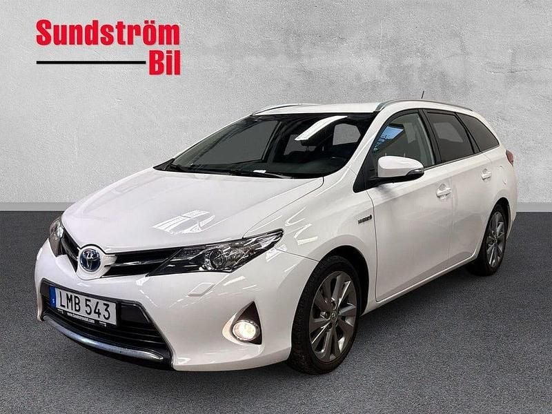 Vit Begagnad 2014 Toyota Auris Hybrid Edition Kombi | 144 900 kr (Marknadspris) - Bild 1/3