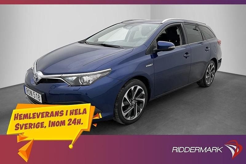 Mörkblå Begagnad 2016 Toyota Auris Hybrid Active Kombi | 158 900 kr (Marknadspris) - Bild 1/3