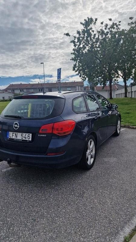 Blå Begagnad 2011 Opel Astra Enjoy Kombi | 39 000 kr (Marknadspris) - Bild 1/4