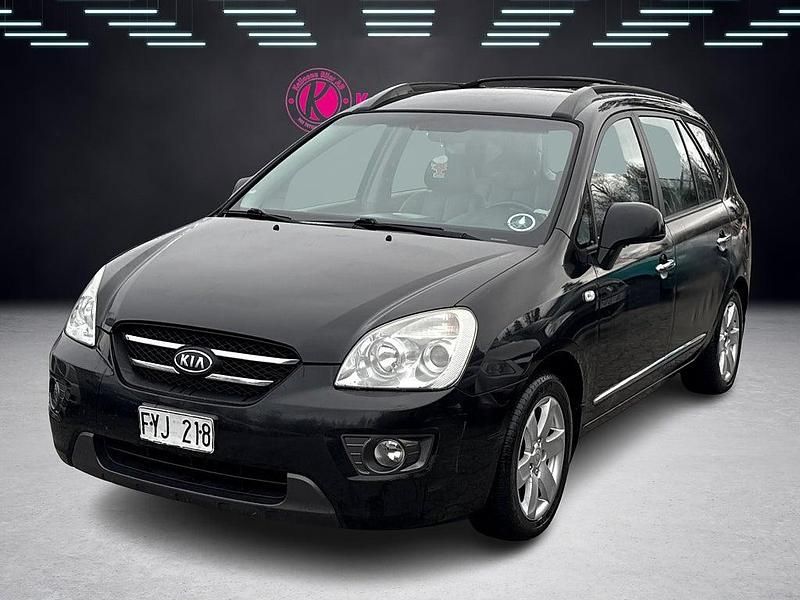 Svart Begagnad 2007 Kia Carens Minibuss | 34 900 kr (Marknadspris) - Bild 1/4