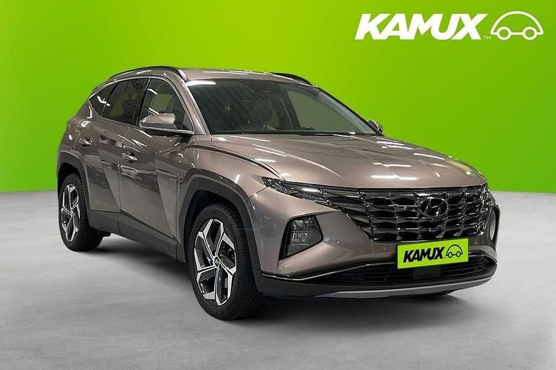 Brun Begagnad 2022 Hyundai Tucson Advanced SUV | 214 800 kr (Marknadspris) - Bild 1/4