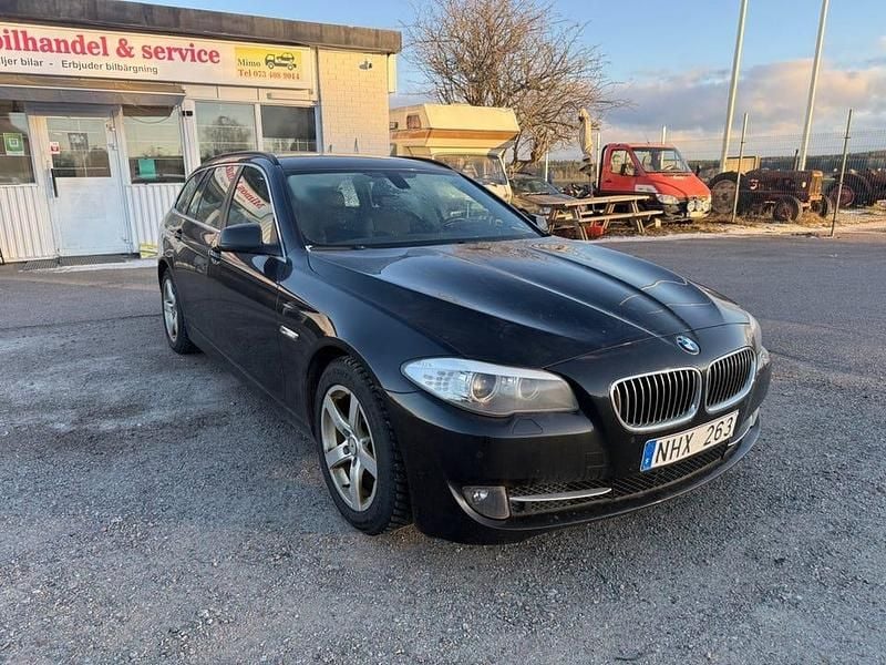 Begagnad BMW 520 184 HK (135 kW) 2013 Svart Kombi
