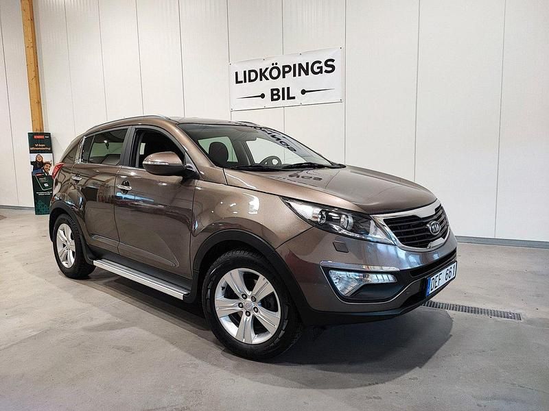 Ljusbrun Begagnad 2012 Kia Sportage Comfort SUV | 79 900 kr (Marknadspris) - Bild 1/4
