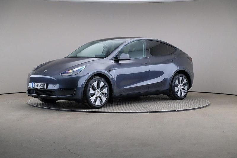 Grå Begagnad 2021 Tesla Model Y Long Range SUV | 315 000 kr - Bild 1/4