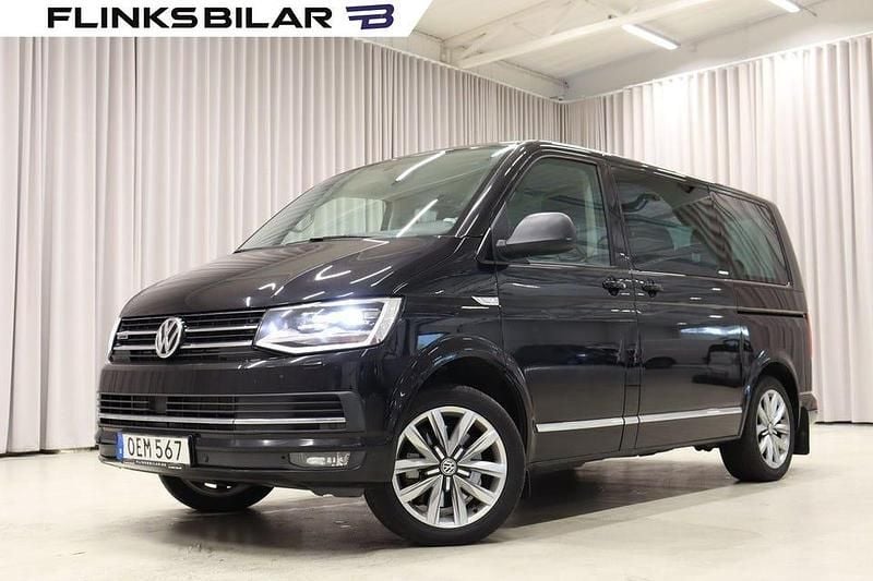 Svart (deep black pärleffekt) Begagnad 2016 VW Multivan Highline Van | 299 800 kr (Marknadspris) - Bild 1/4