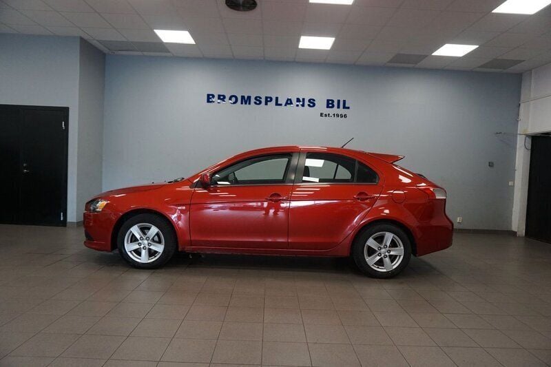 Mörkröd (rödmetallic) Begagnad 2009 Mitsubishi Lancer Sportback Halvkombi | 36 500 kr - Bild 1/4