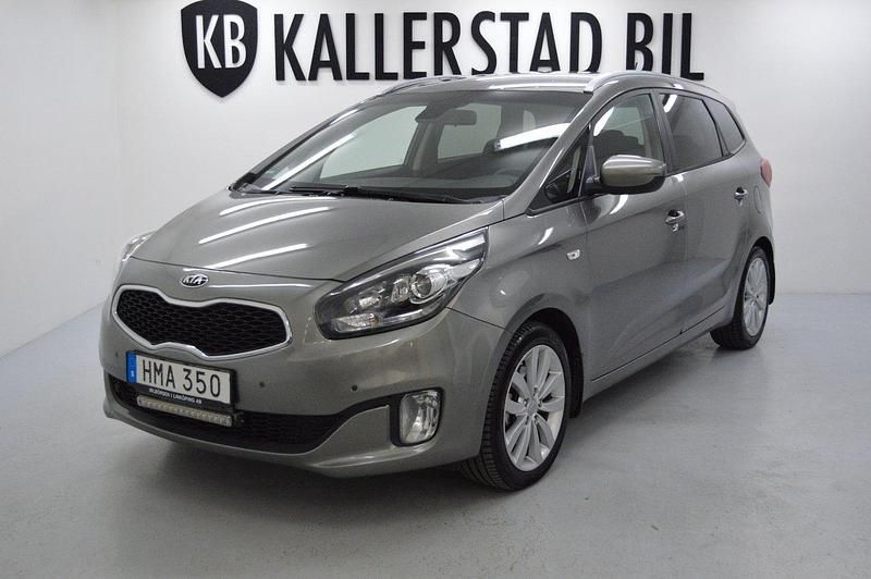 Grå Begagnad 2016 Kia Carens 2 Minibuss | 79 900 kr (Marknadspris) - Bild 1/4