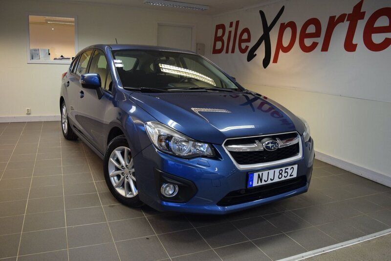 Mörkblå (blå) Begagnad 2013 Subaru Impreza Halvkombi | 99 900 kr (Marknadspris) - Bild 1/4