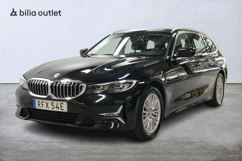 Svart Begagnad 2021 BMW 320 Luxury Line Kombi | 299 900 kr (Marknadspris) - Bild 1/3