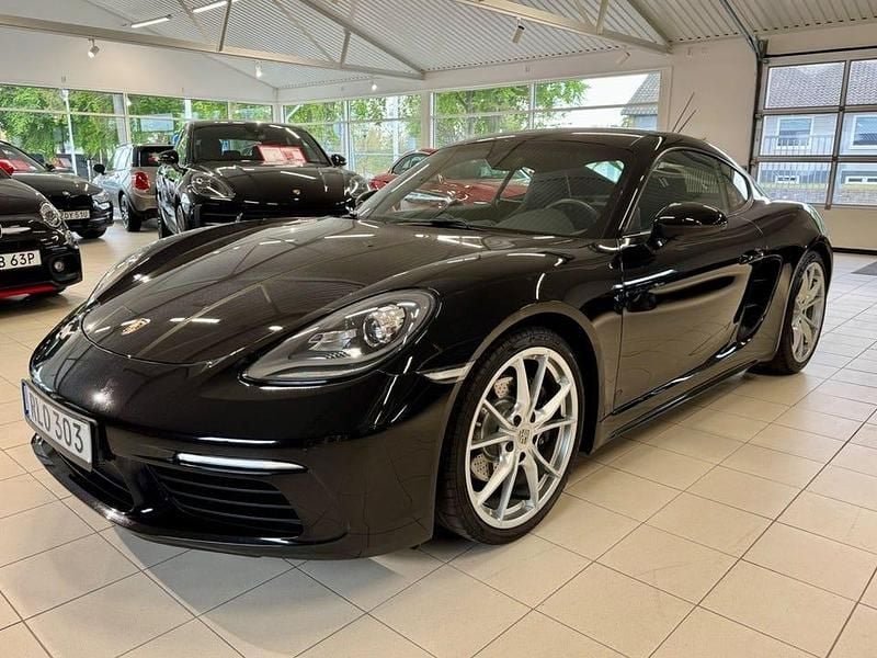 Svartmetallick Begagnad 2018 Porsche 718 Cayman Sport Sportkupé | 569 900 kr - Bild 1/4