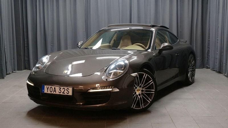Mörkbrun Begagnad 2013 Porsche 911 Carrera Sportkupé | 599 000 kr - Bild 1/4