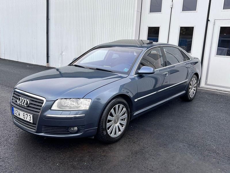 Blå Begagnad 2004 Audi A8L W12 Sedan | 279 000 kr - Bild 1/4