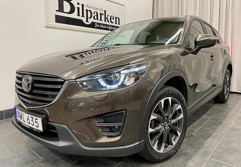 Brun Begagnad 2015 Mazda CX-5 SUV | 149 900 kr (Lite dyr) - Bild 1/3