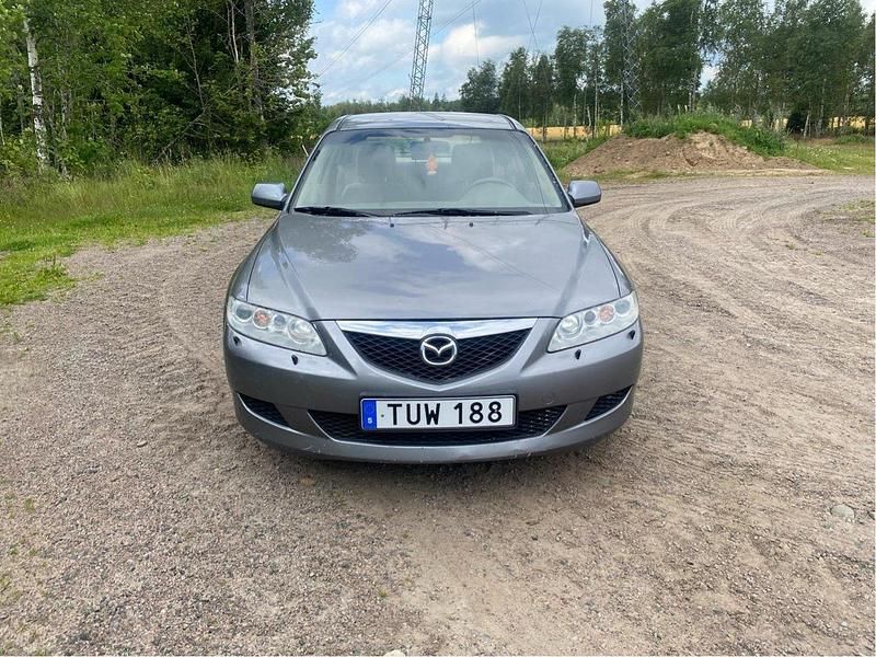 Grå Begagnad 2003 Mazda 2 Inclusive Halvkombi | 11 900 kr - Bild 1/4
