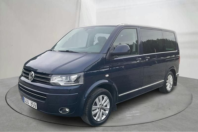 Mörkblå Begagnad 2012 VW Multivan Highline Sedan | 180 000 kr - Bild 1/4