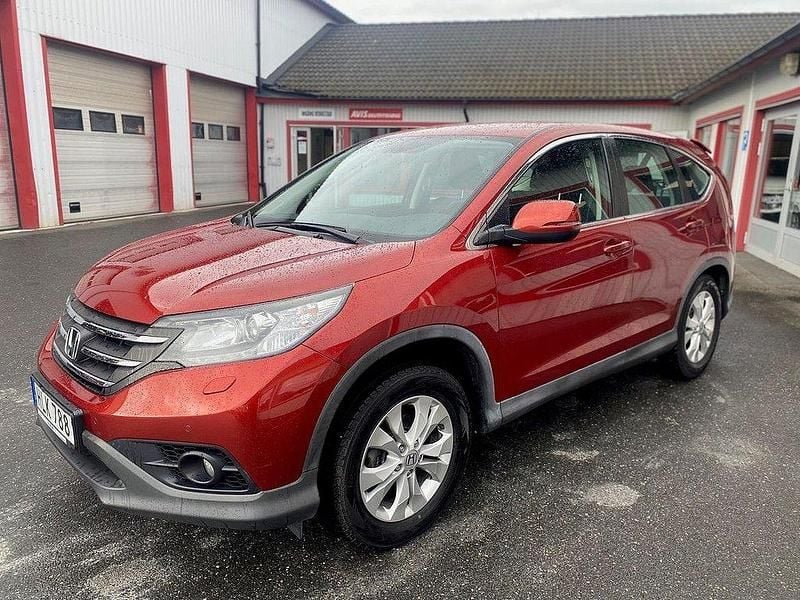 Röd Begagnad 2014 Honda CR-V SUV | 109 900 kr (Marknadspris) - Bild 1/4