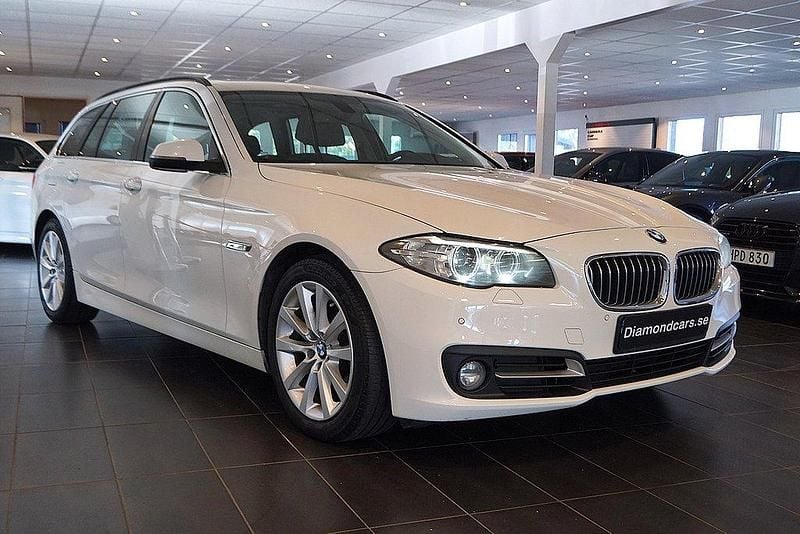 Vit Begagnad 2014 BMW 520 Kombi | 149 900 kr (Marknadspris) - Bild 1/4
