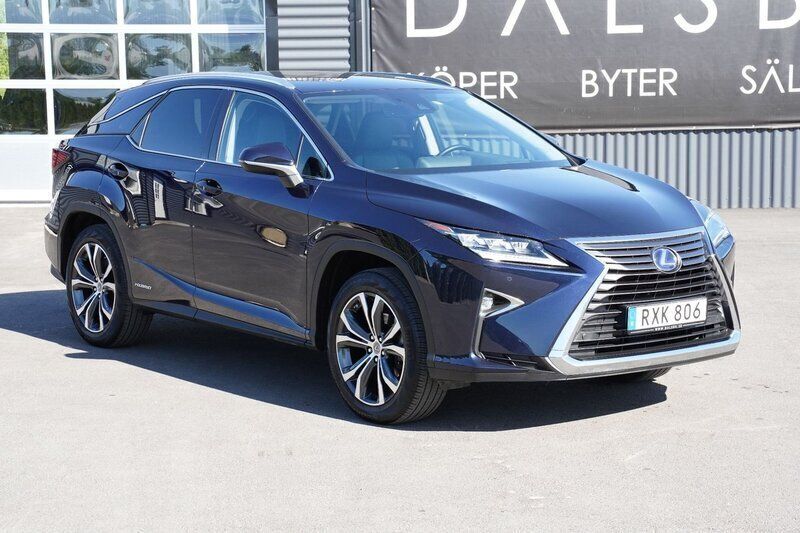 Mörkblå (nightfall mica) Begagnad 2017 Lexus RX450h Executive Line SUV | 389 000 kr (Marknadspris) - Bild 1/4