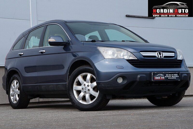 Mörkgrå (grå) Begagnad 2007 Honda CR-V SUV | 39 900 kr (Marknadspris) - Bild 1/4