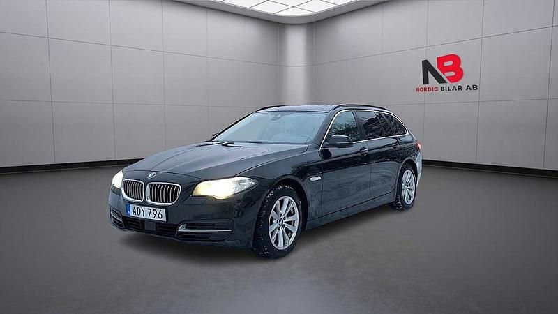 Svart Begagnad 2015 BMW 520 Kombi | 124 900 kr (Marknadspris) - Bild 1/4