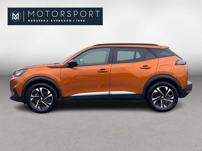 Begagnad Peugeot e-2008 100 kW (136 HK) 2023 Orange metallic SUV