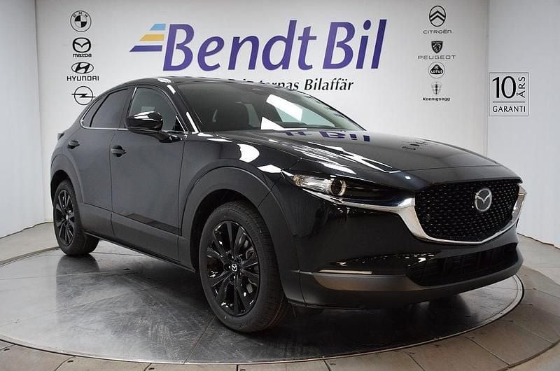 Svart Begagnad 2025 Mazda CX-30 Homura-Line SUV | 329 500 kr (Marknadspris) - Bild 1/3
