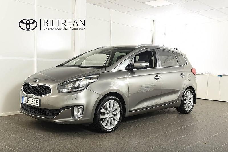 Grå Begagnad 2013 Kia Carens Minibuss | 109 900 kr (Marknadspris) - Bild 1/4