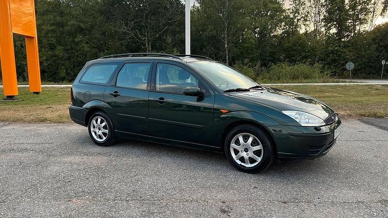 Mörkgrön Begagnad 2004 Ford Focus Kombi | 21 800 kr (Marknadspris) - Bild 1/4