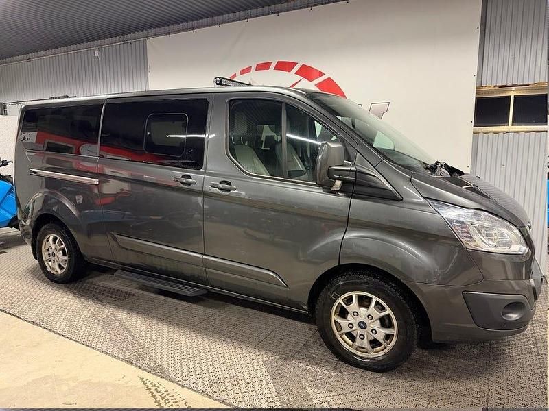 Grå Begagnad 2018 Ford Tourneo Custom Van | 269 900 kr (Marknadspris) - Bild 1/4