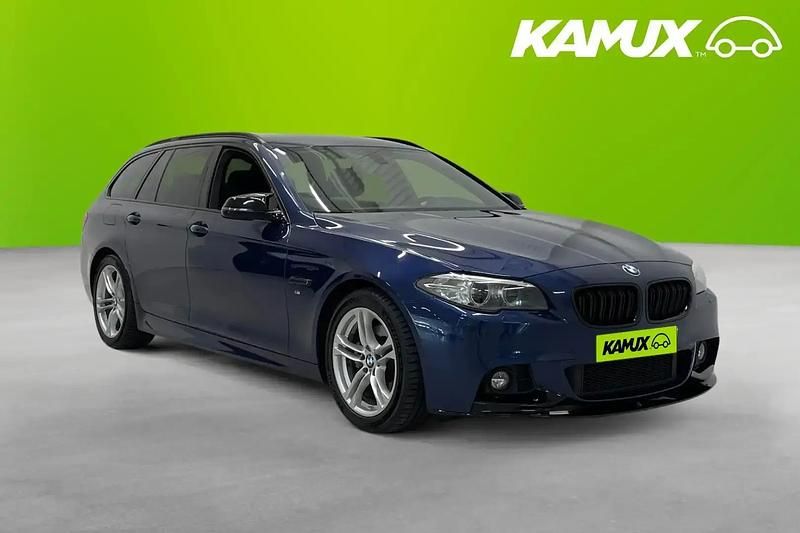 Blå Begagnad 2017 BMW 520 Kombi | 208 700 kr (Marknadspris) - Bild 1/4