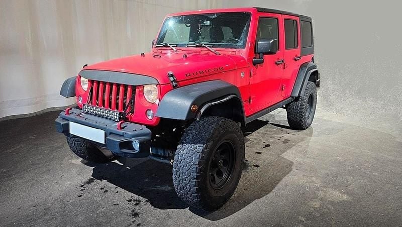 Röd Begagnad 2016 Jeep Wrangler Unlimited Rubicon SUV | 379 900 kr (Dyr) - Bild 1/4