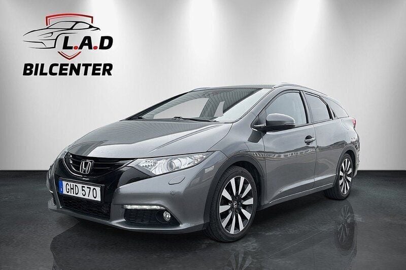 Mörkgrå Begagnad 2014 Honda Civic Lifestyle Kombi | 109 700 kr (Marknadspris) - Bild 1/4