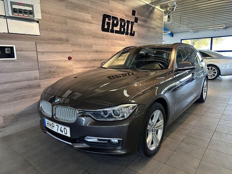 Brun Begagnad 2014 BMW 320 Kombi | 129 000 kr (Marknadspris) - Bild 1/4