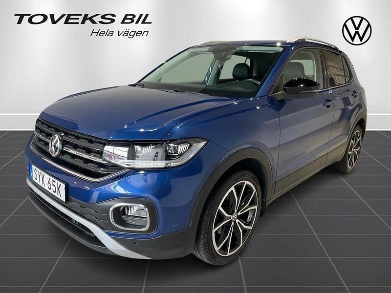Blå (reef blue metallic) Begagnad 2020 VW T-Cross Style SUV | 209 000 kr (Bra pris) - Bild 1/4