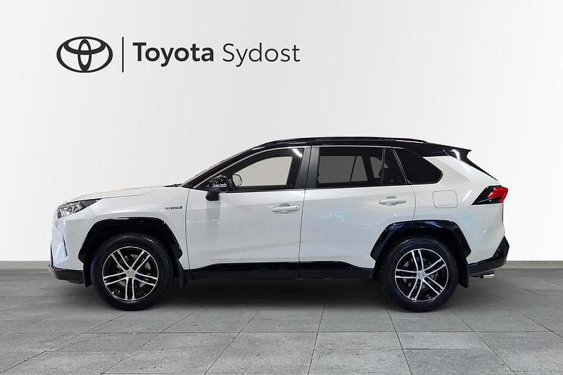Begagnad Toyota RAV4 Hybrid Style 220 HK (161 kW) 2019 White pearl med svart tak SUV