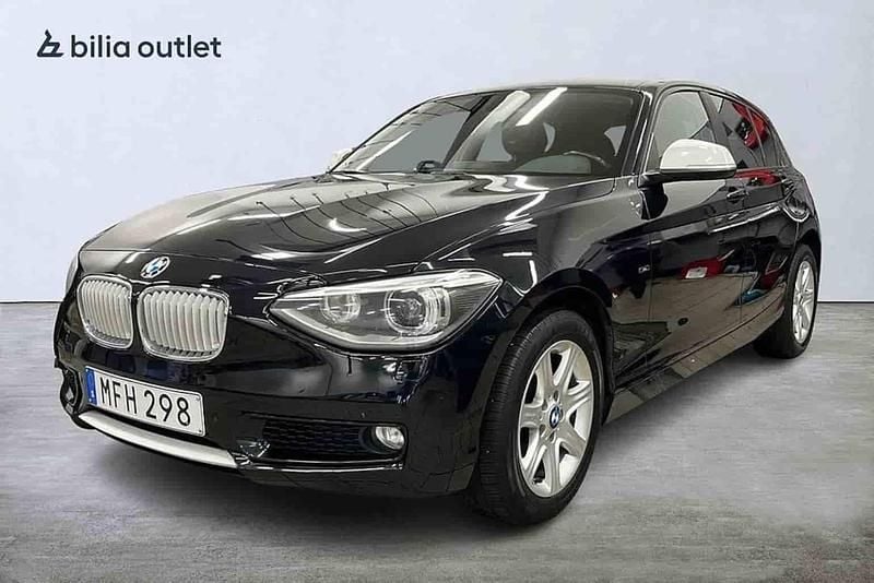 Svart Begagnad 2013 BMW 120 Halvkombi | 119 900 kr (Marknadspris) - Bild 1/1