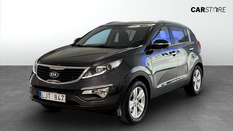 Grå Begagnad 2013 Kia Sportage Comfort SUV | 129 900 kr (Marknadspris) - Bild 1/4