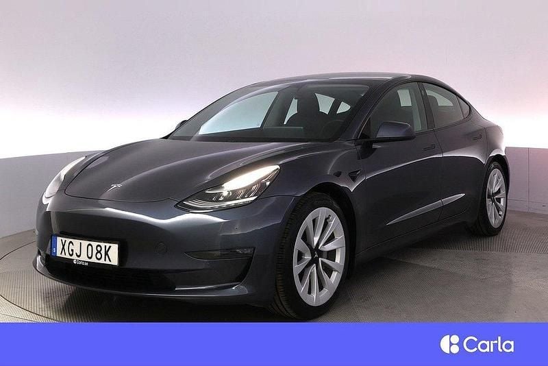 Grå Begagnad 2020 Tesla Model 3 Long Range AWD Sedan | 299 900 kr (Dyr) - Bild 1/4