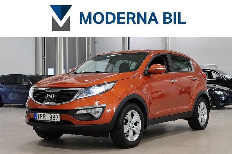 Orange Begagnad 2013 Kia Sportage Comfort SUV | 79 700 kr (Bra pris) - Bild 1/4
