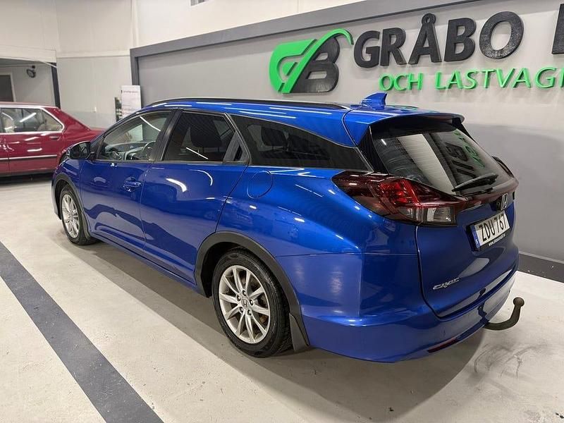 Begagnad Honda Civic Elegance 120 HK (88 kW) 2017 Blå Kombi