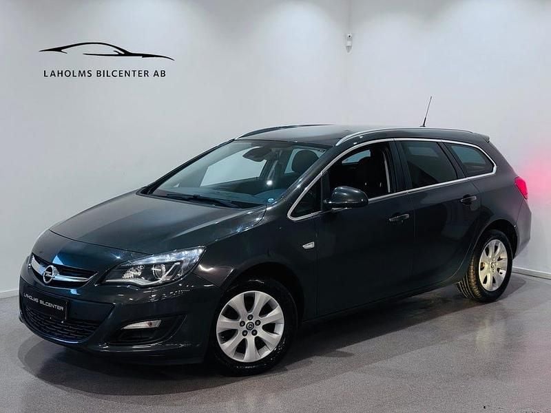 Grå Begagnad 2016 Opel Astra drive Kombi | 79 900 kr (Marknadspris) - Bild 1/4