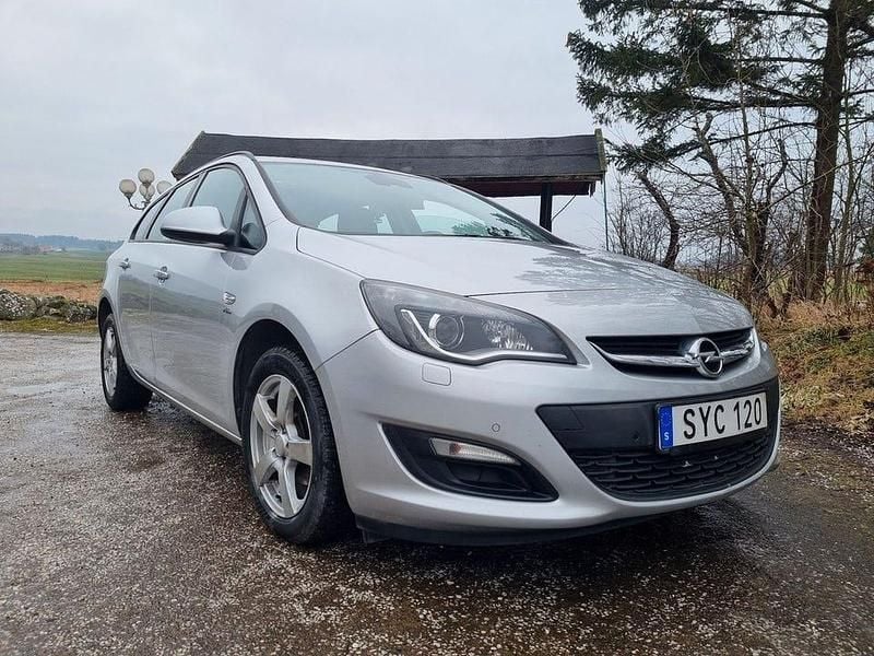 Grå Begagnad 2014 Opel Astra Enjoy Kombi | 59 800 kr (Marknadspris) - Bild 1/4