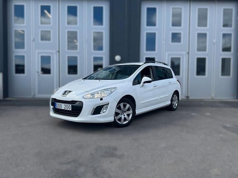 Begagnad Peugeot 308 SW 114 HK (83 kW) 2013 Vit Kombi