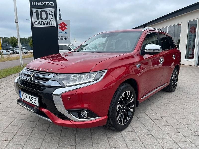 Röd Begagnad 2017 Mitsubishi Outlander P-HEV SUV | 188 000 kr (Marknadspris) - Bild 1/4