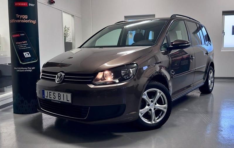 Brown pearl metallic Begagnad 2012 VW Touran S Minibuss | 79 900 kr (Marknadspris) - Bild 1/4
