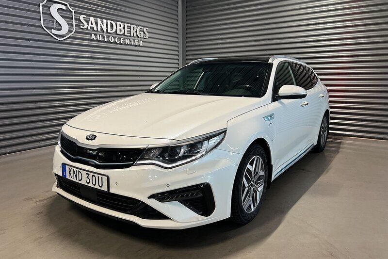 Vit Begagnad 2018 Kia Optima Hybrid 2 Sedan | 179 500 kr (Marknadspris) - Bild 1/4