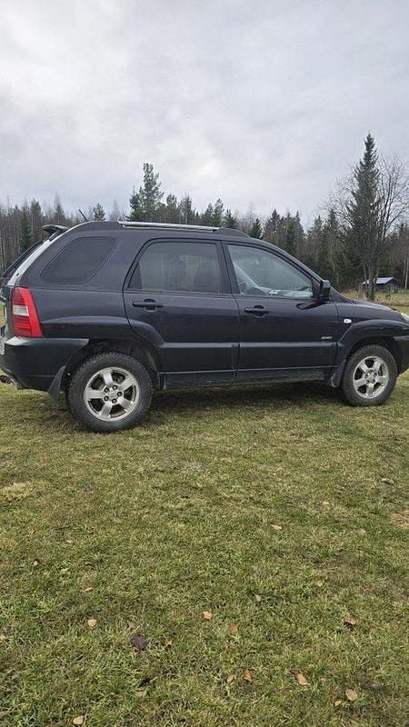 Svart Begagnad 2008 Kia Sportage 4 SUV | 30 000 kr (Marknadspris) - Bild 1/3